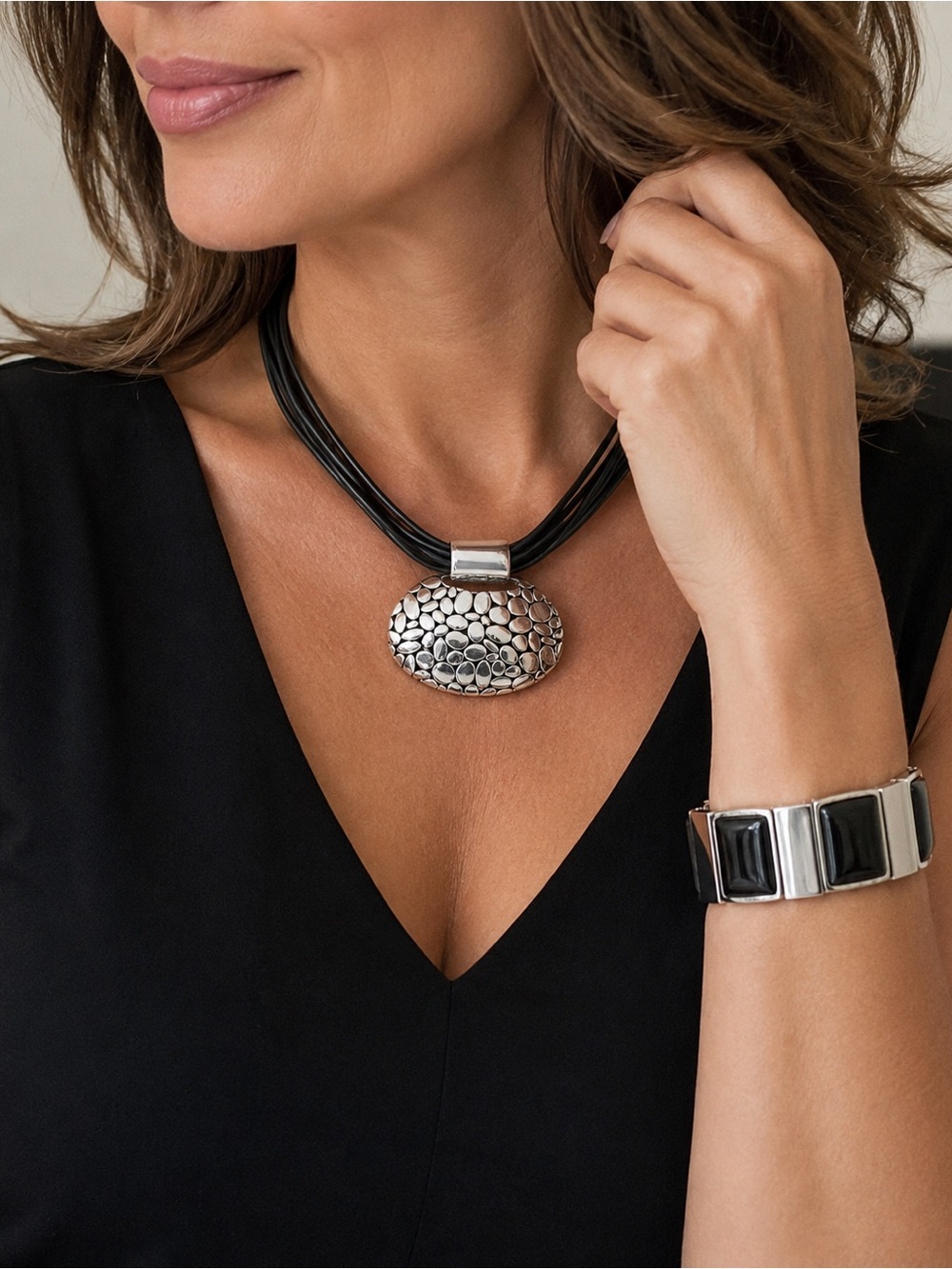 Silver Tone Oval Pendant Necklace with Black Multi-Strand Cord